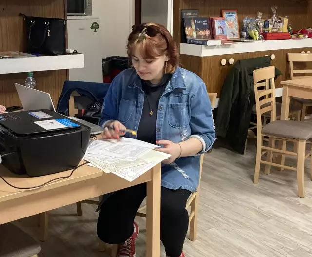 Zapisování výsledků při šachovém turnaji v Pelhřimově.